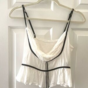 White Sleeveless Top with Black Trim